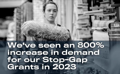 Image of a boom operator holding a mic pole. Overlaying text reads: We've seen an 800% increase in demand for our Stop-Gap Grants in 2023.